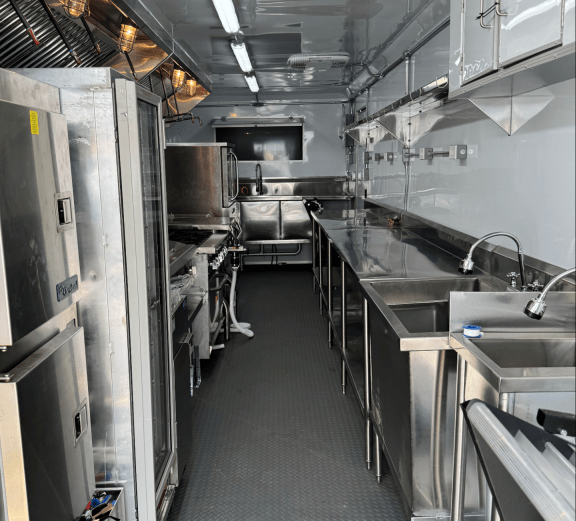 Interior view of a commercial kitchen trailer