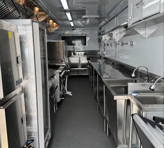 Interior view of a commercial kitchen trailer