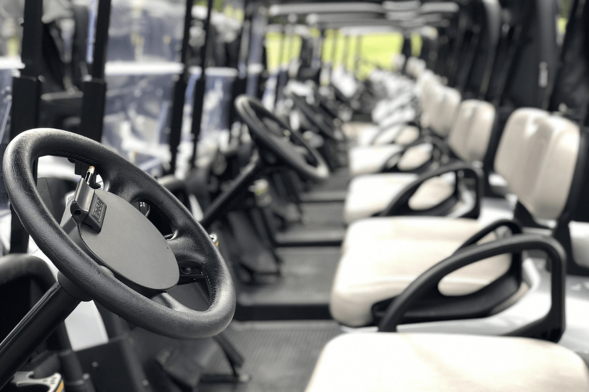 Blue and white rental golf cart