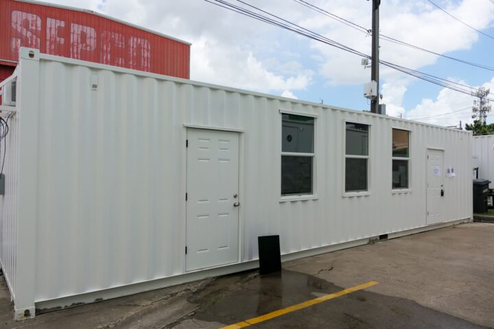 Container office with keyed front door and windows