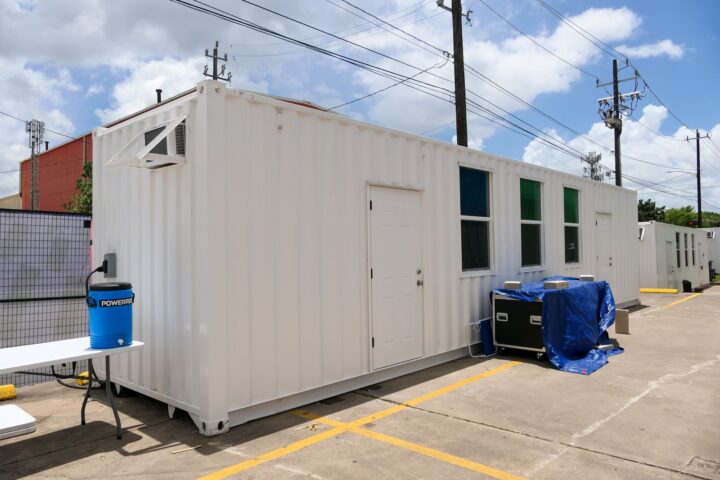 Container office with HVAC unit, windows and dual entry doors
