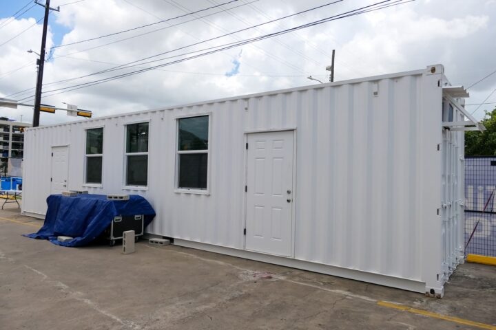 Container office rental unit with windows and entry door